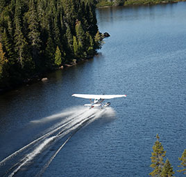 Photo of an airplane on water. Link to Gifts by Will.